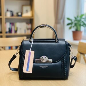 structured top handle handbag with twist lock & woven trim
